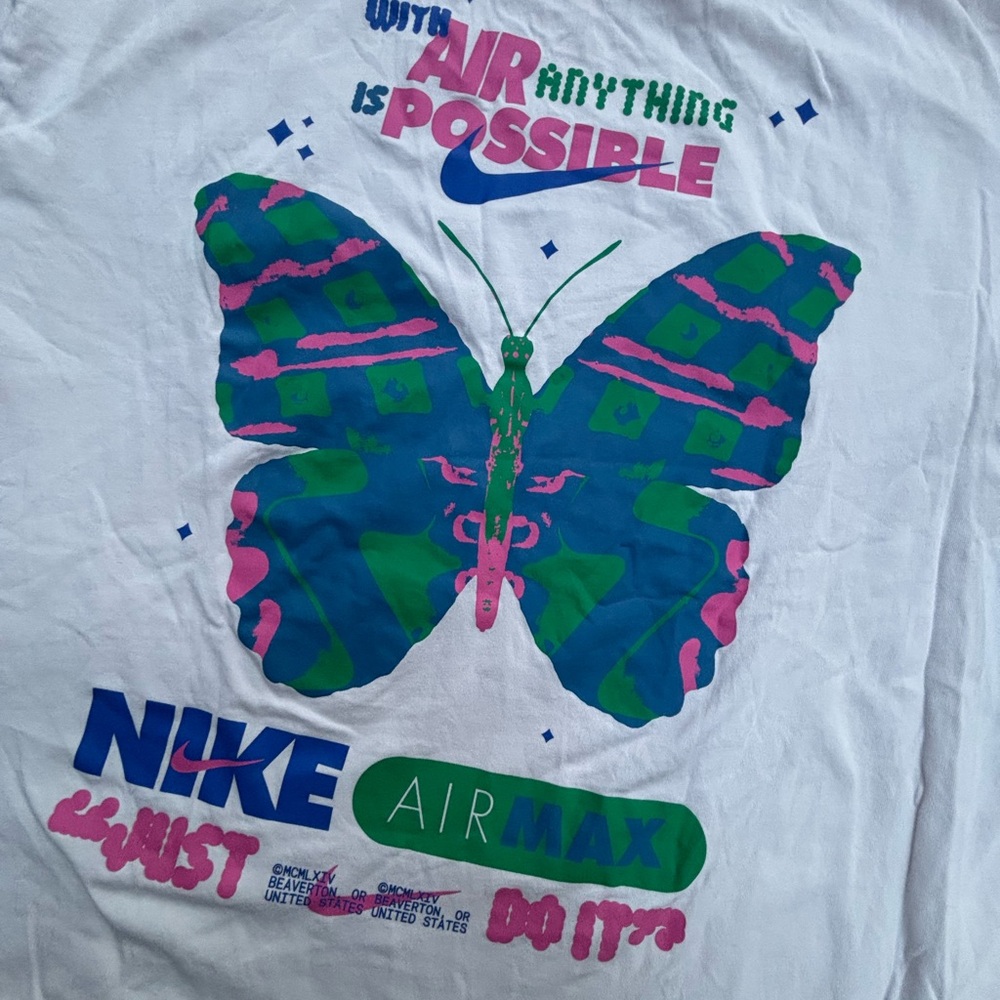 Nike White Tee with Colorful Butterfly Design